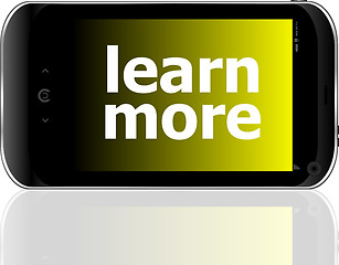 Image showing smart phone with learn more word, business concept