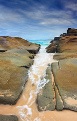 Image showing Steadfast,  Sea wash through rock crevice