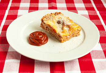 Image showing Portion of tasty lasagna on a plate 