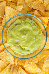 Image showing Nacho chips with fresh guacamole dip