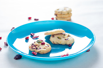 Image showing Cranberry cookies on blue plate