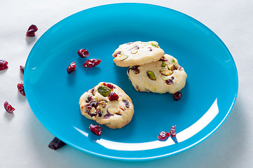 Image showing Cranberry cookies on blue plate
