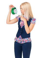 Image showing Girl with alarm clock