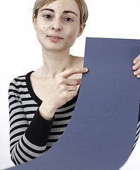 Image showing Woman holding a paper