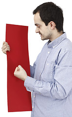 Image showing Man holding a paper