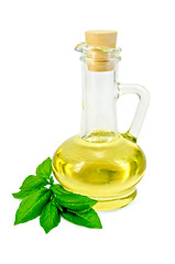 Image showing Vegetable oil in a carafe with basil
