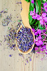 Image showing Herbal tea of fireweed on wooden spoon