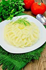 Image showing Potatoes mashed  with butter on board