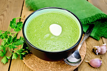 Image showing Puree from spinach with garlic on board