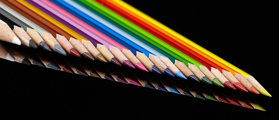 Image showing colorful pencils in a row