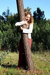 Image showing Embracing a tree