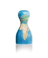 Image showing Wooden pawn with a painting of a map