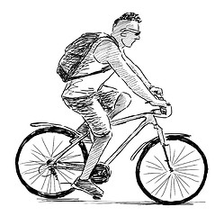 Image showing man riding a cycle