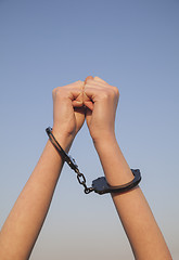 Image showing Handcuffed woman hands