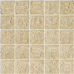 Image showing handwritten alphabet letters on sand