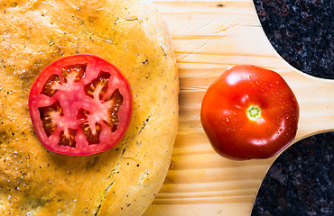 Image showing Loaf of Focaccia bread with tomatoes.