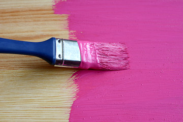 Image showing Pine board being painted 