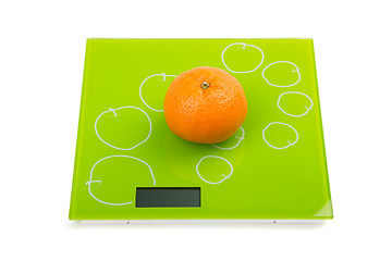 Image showing Sweet mandarin on scales