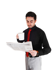 Image showing Businessman reading paper.