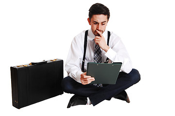 Image showing Businessman sitting on floor.