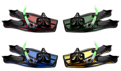 Image showing Set of multicolored flippers, mask and snorkel with water drops