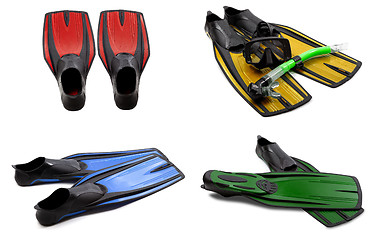 Image showing Set of multicolored swim fins, mask, snorkel for diving with wat