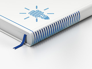 Image showing Business concept: closed book, Energy Saving Lamp on white background