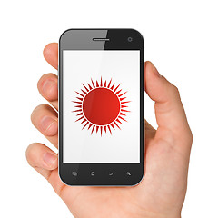 Image showing Vacation concept: Sun on smartphone