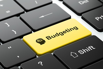 Image showing Finance concept: Head With Finance Symbol and Budgeting on computer keyboard background