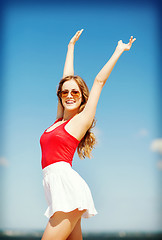 Image showing girl standing on the beach