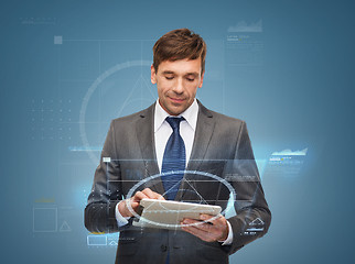 Image showing buisnessman with tablet pc