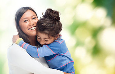 Image showing hugging mother and daughter