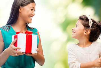 Image showing happy mother and child girl with gift box