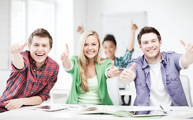 Image showing students showing thumbs up at school