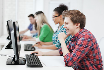 Image showing student with computer studying at school