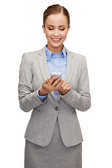 Image showing young smiling businesswoman with smartphone