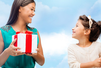 Image showing happy mother and child girl with gift box