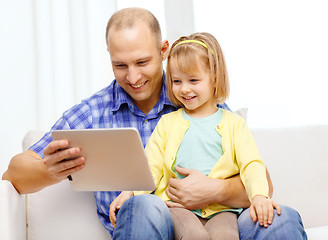 Image showing happy father and daughter with tablet pc computer