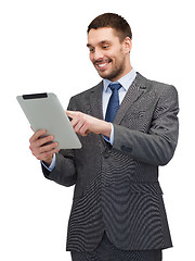 Image showing smiling buisnessman with tablet pc computer