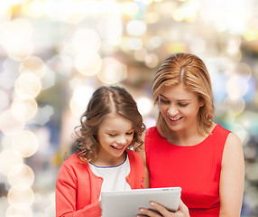 Image showing mother and daughter with tablet pc computer