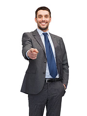 Image showing handsome buisnessman pointing finger at you