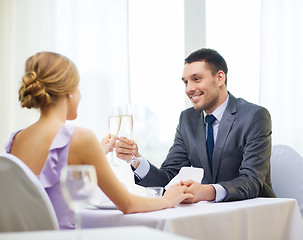 Image showing couple with glasses of champagne at restaurant