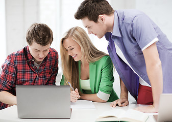 Image showing students writing test or exam in lecture at school