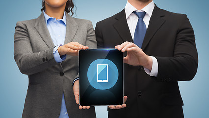 Image showing businessman and businesswoman with tablet pc