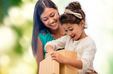 Image showing happy mother and child girl with gift box