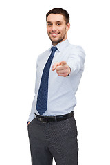 Image showing handsome buisnessman pointing finger at you