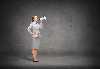 Image showing smiling businesswoman with megaphone