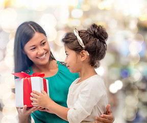 Image showing happy mother and child girl with gift box