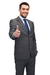 Image showing handsome buisnessman showing thumbs up