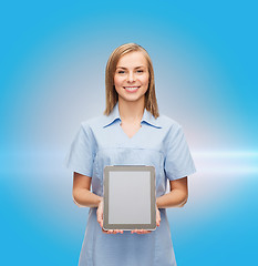 Image showing smiling female doctor or nurse with tablet pc